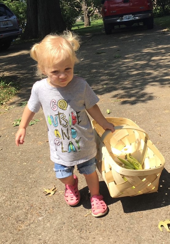 Julia has been gardening from a very young age. Photo courtesy of Kay Eskridge.