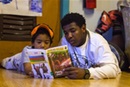 A Freedom School volunteer reads with a young scholar at Summit on 16th United Methodist Church in Columbus, Ohio. Freedom Schools "build strong, literate, and empowered children." Photo by Gwen Kisker, United Methodist Communications.