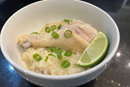 Arroz caldo rice porridge with chicken is a dish traditionally served to ring in the New Year in the Philippines